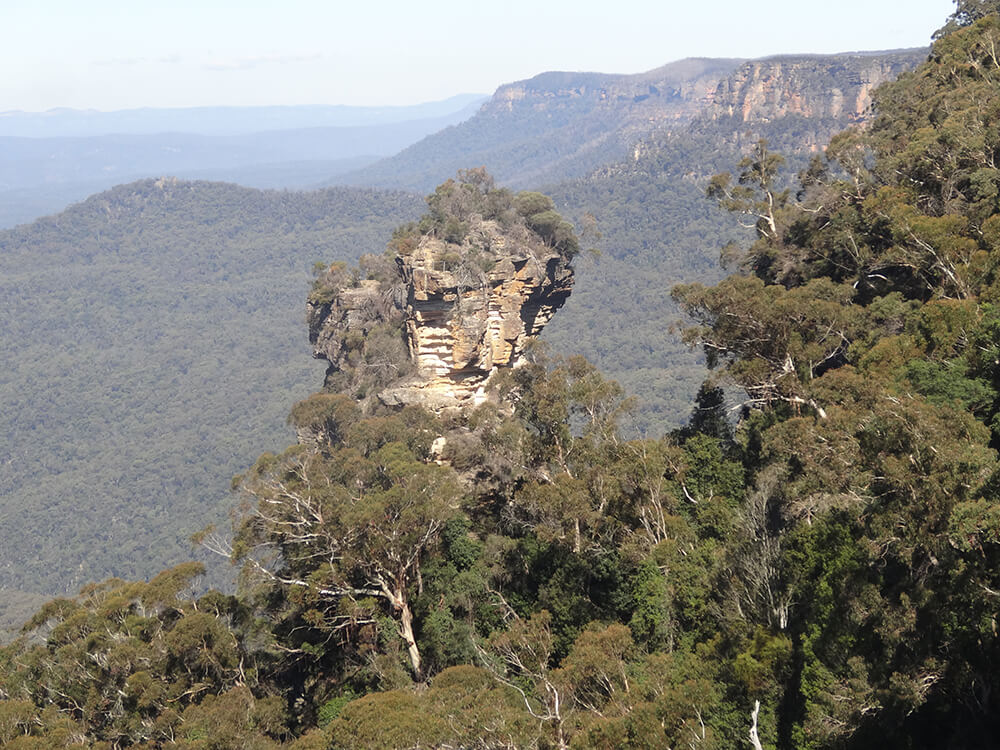 Orphan Rock, a stone pillar About the Mountains