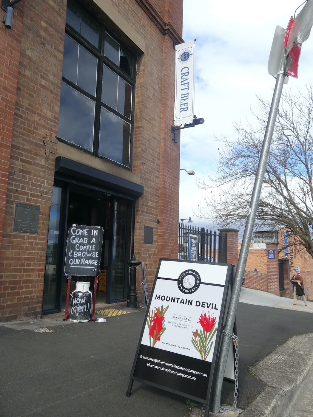 Mountain Devil Gin poster outside the Carrington Hotel